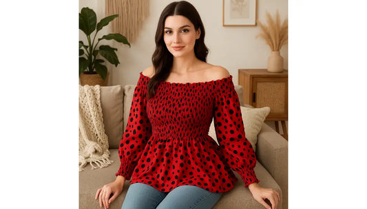 Woman wearing red off-shoulder smocked peplum top with polka dots